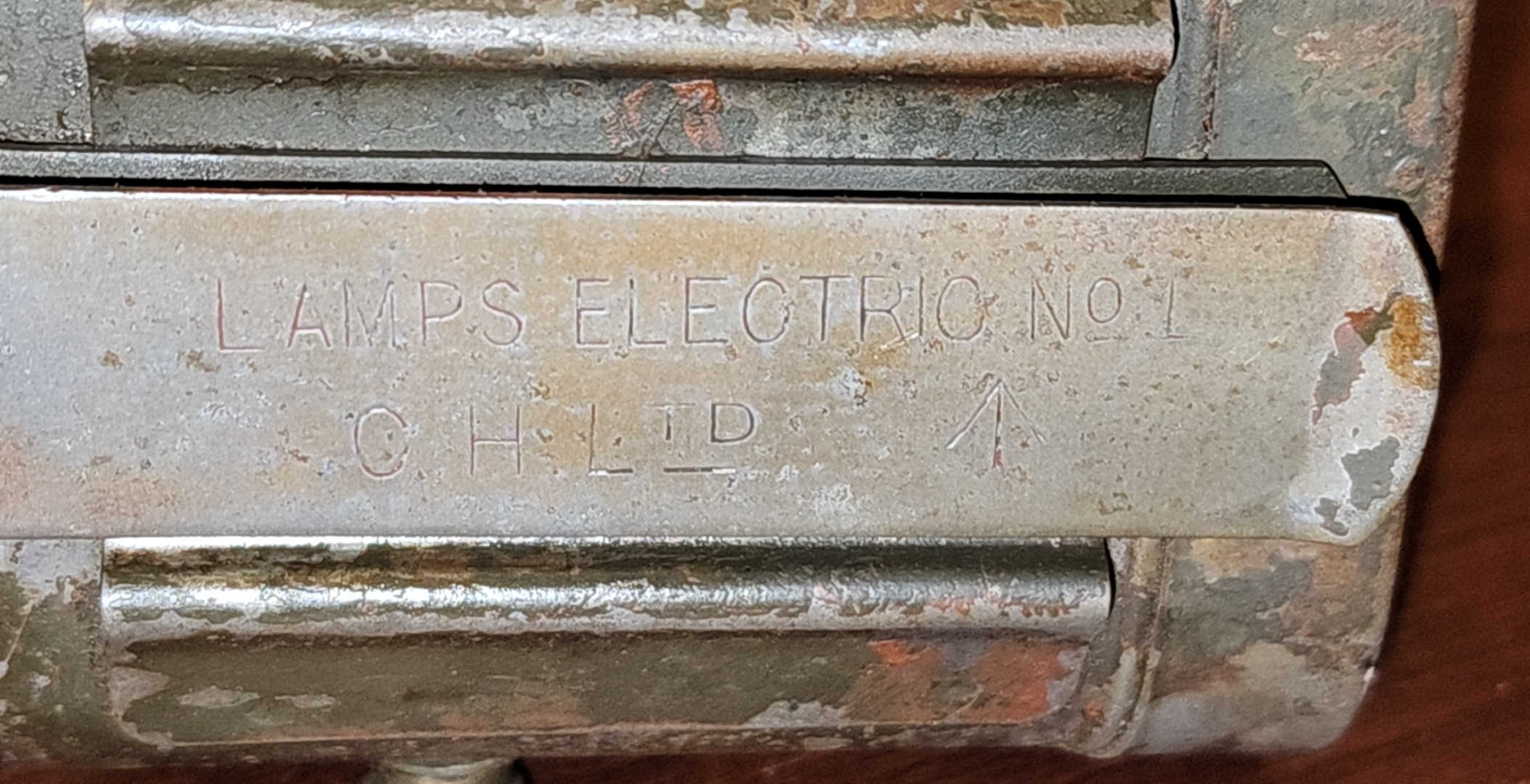 Rear of Lamp, Electric, No. 1 showing C.H. LTD markings and Broad Arrow