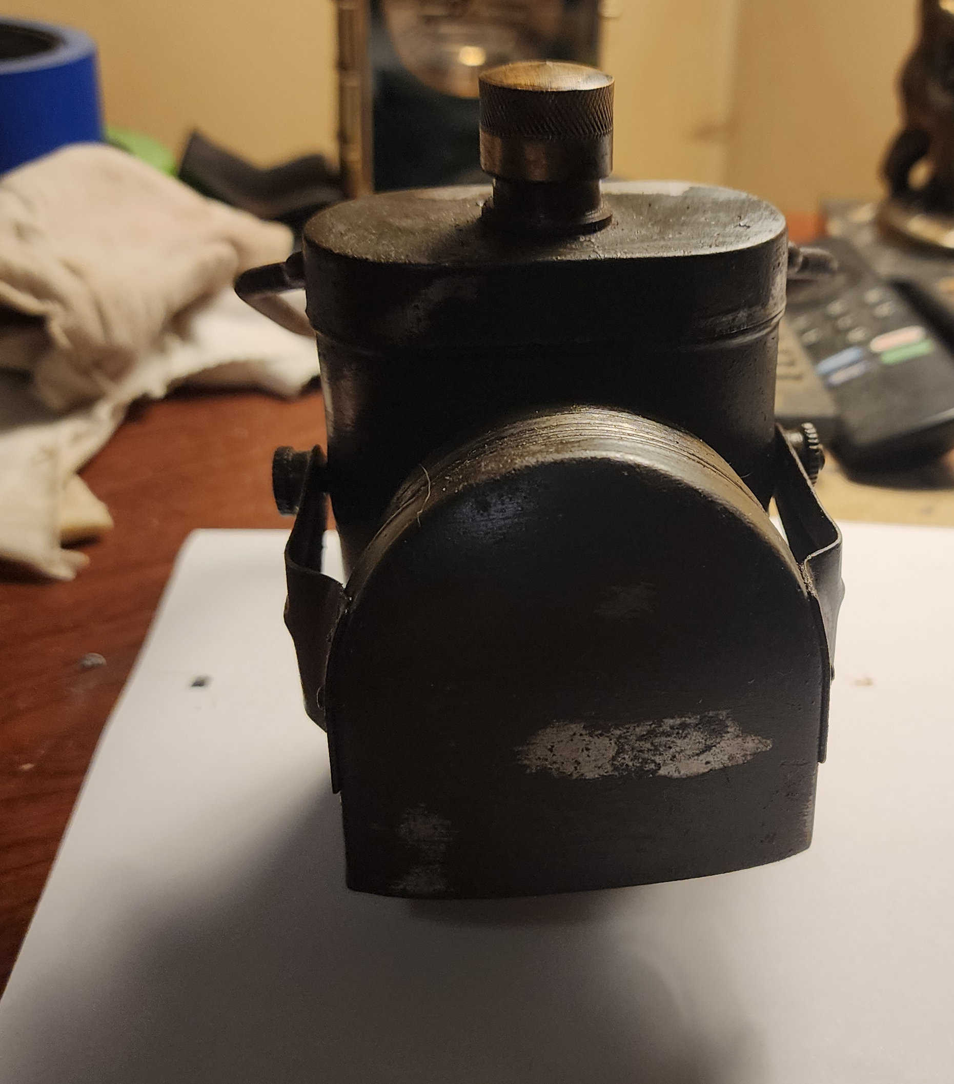 Blackout lamp before restoration, hood closed with dust and grime