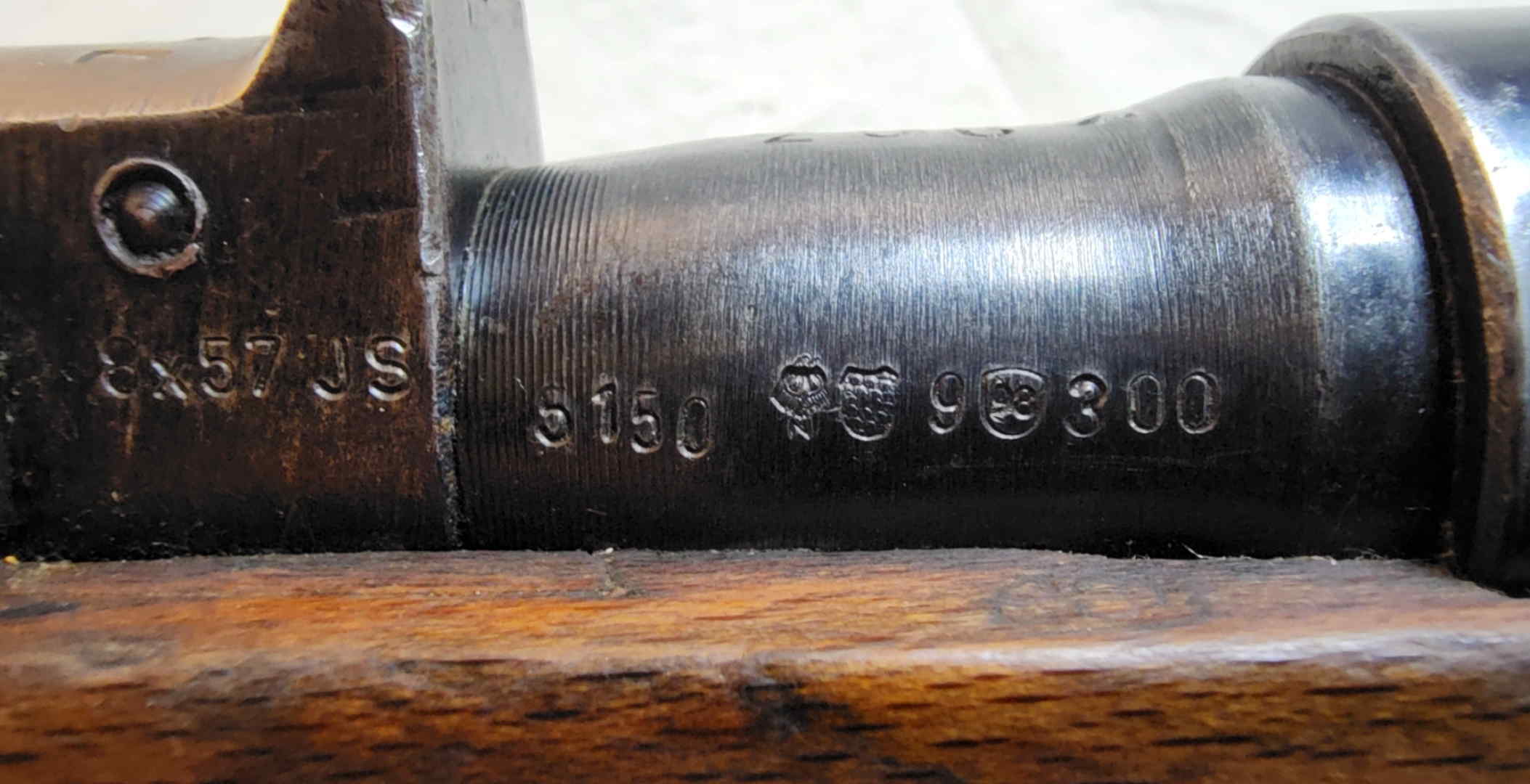 Barrel shank showing 8x57 JS caliber marking, number 5150, German Eagle N nitro proof, Munich proof-house shield and additional 9 98 300 markings