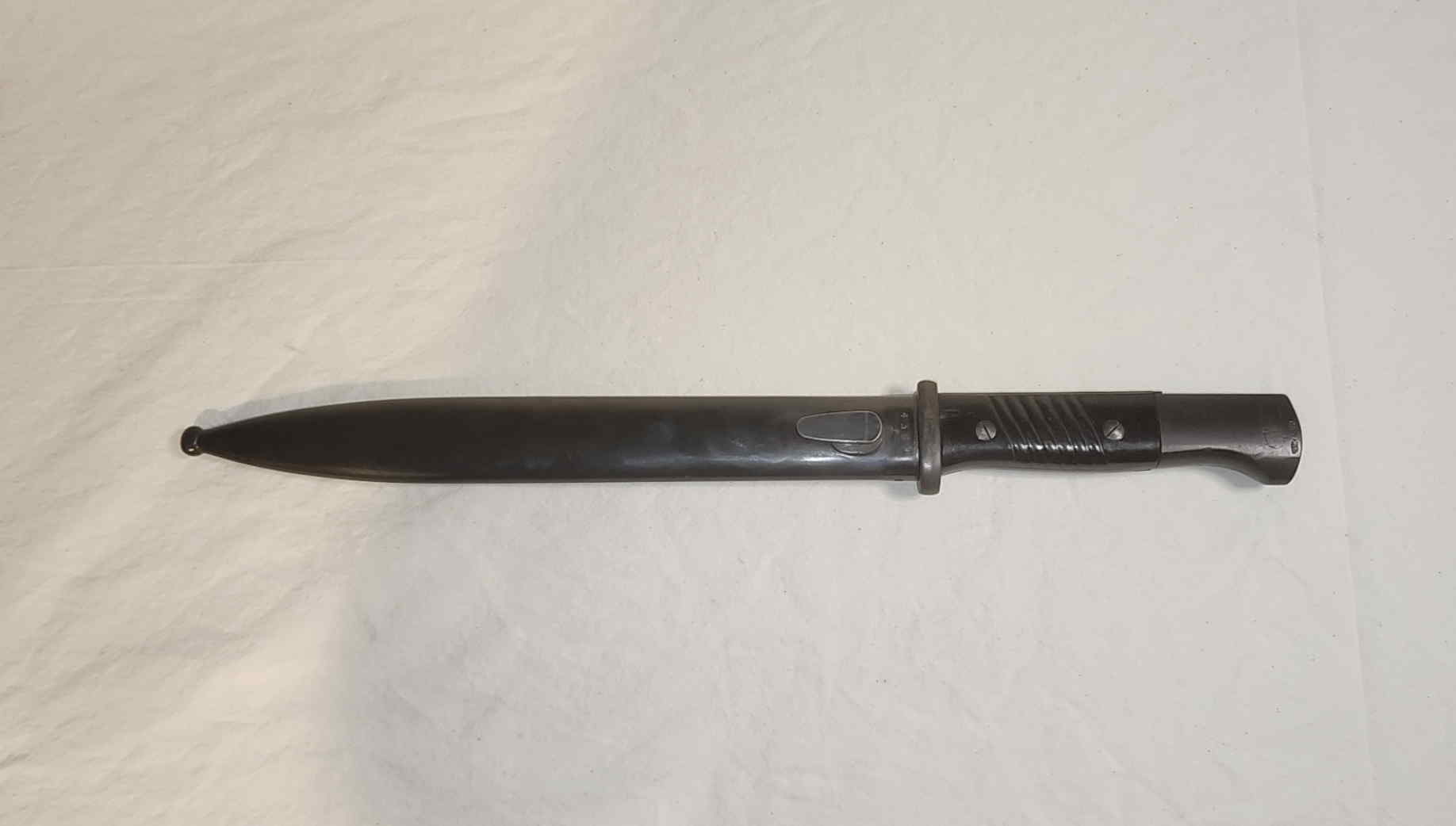 German S84/98 III bayonet seated in its steel scabbard