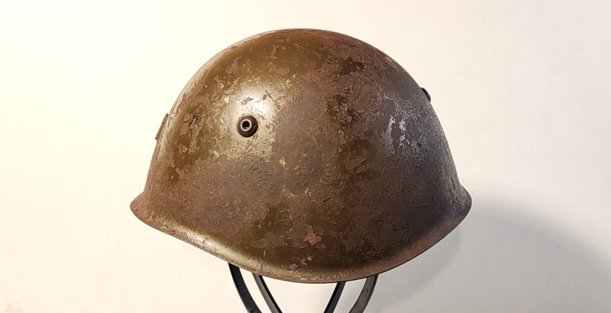 Left side of Italian M33 helmet