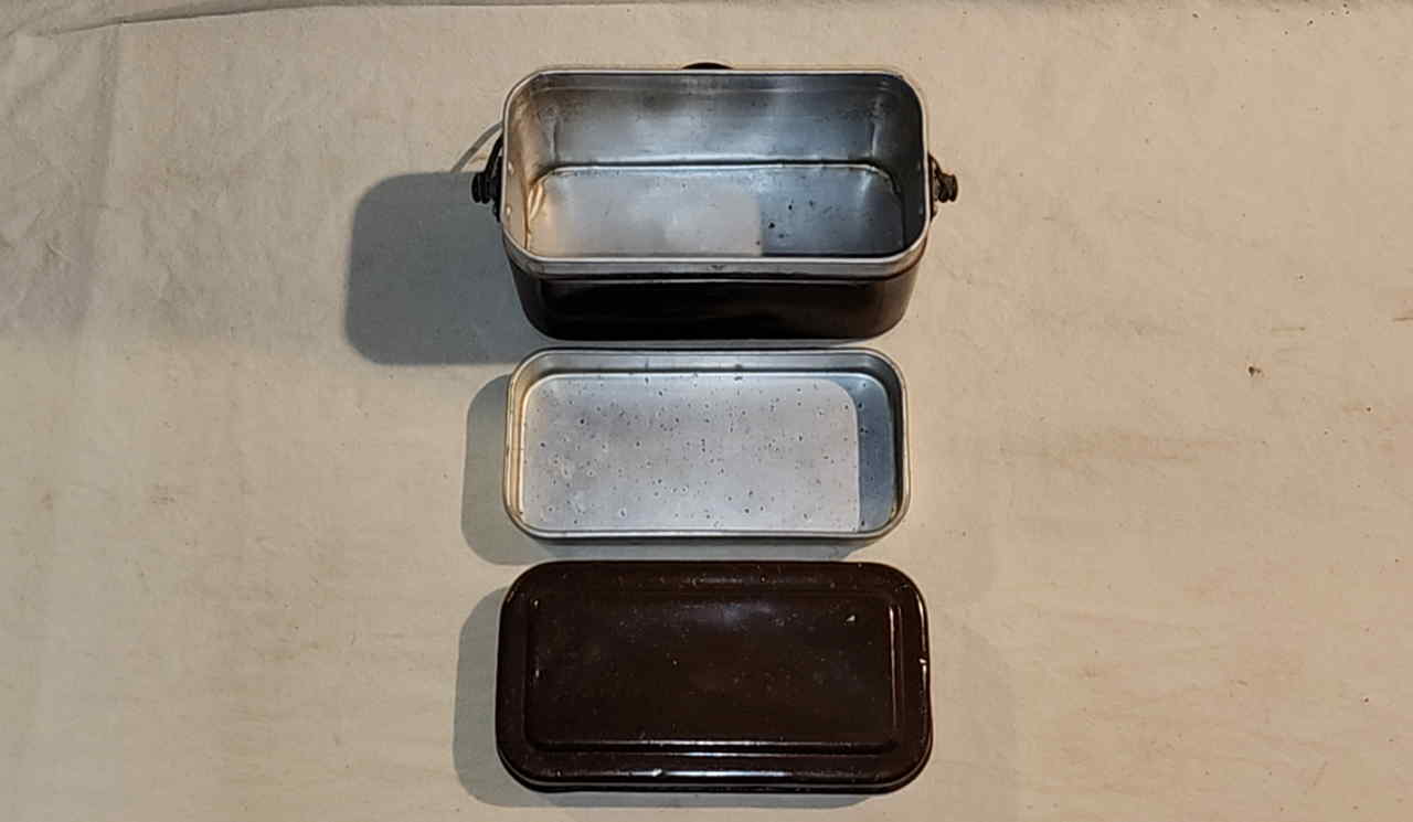 Open Japanese officer mess kit with removable tray and lid separated