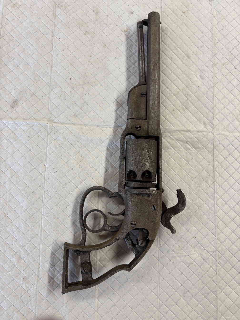Full view of the revolver after cleaning and conservation
