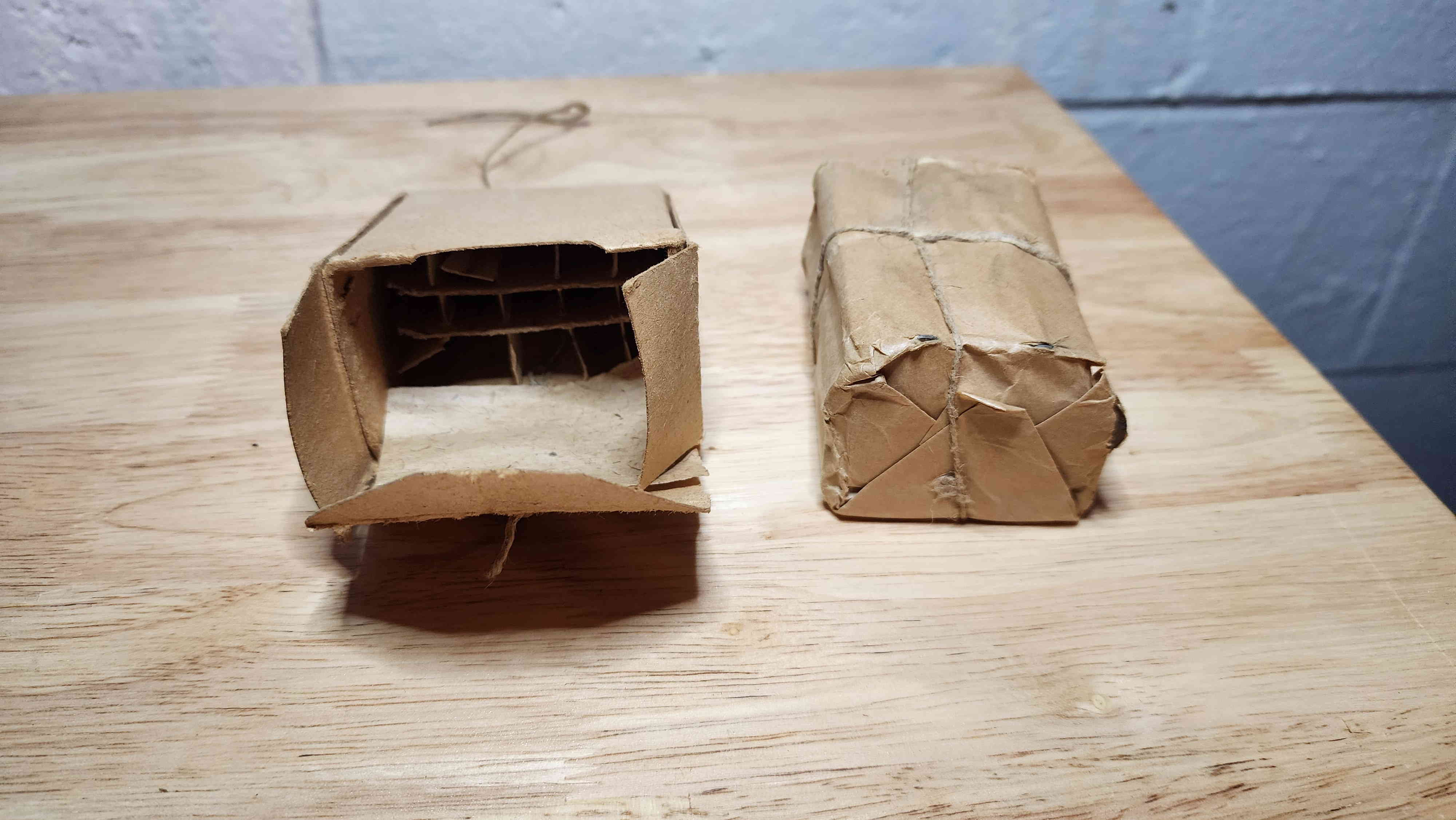 Unopened 20-round Soviet paper packet of 7.62×54mmR tied with string