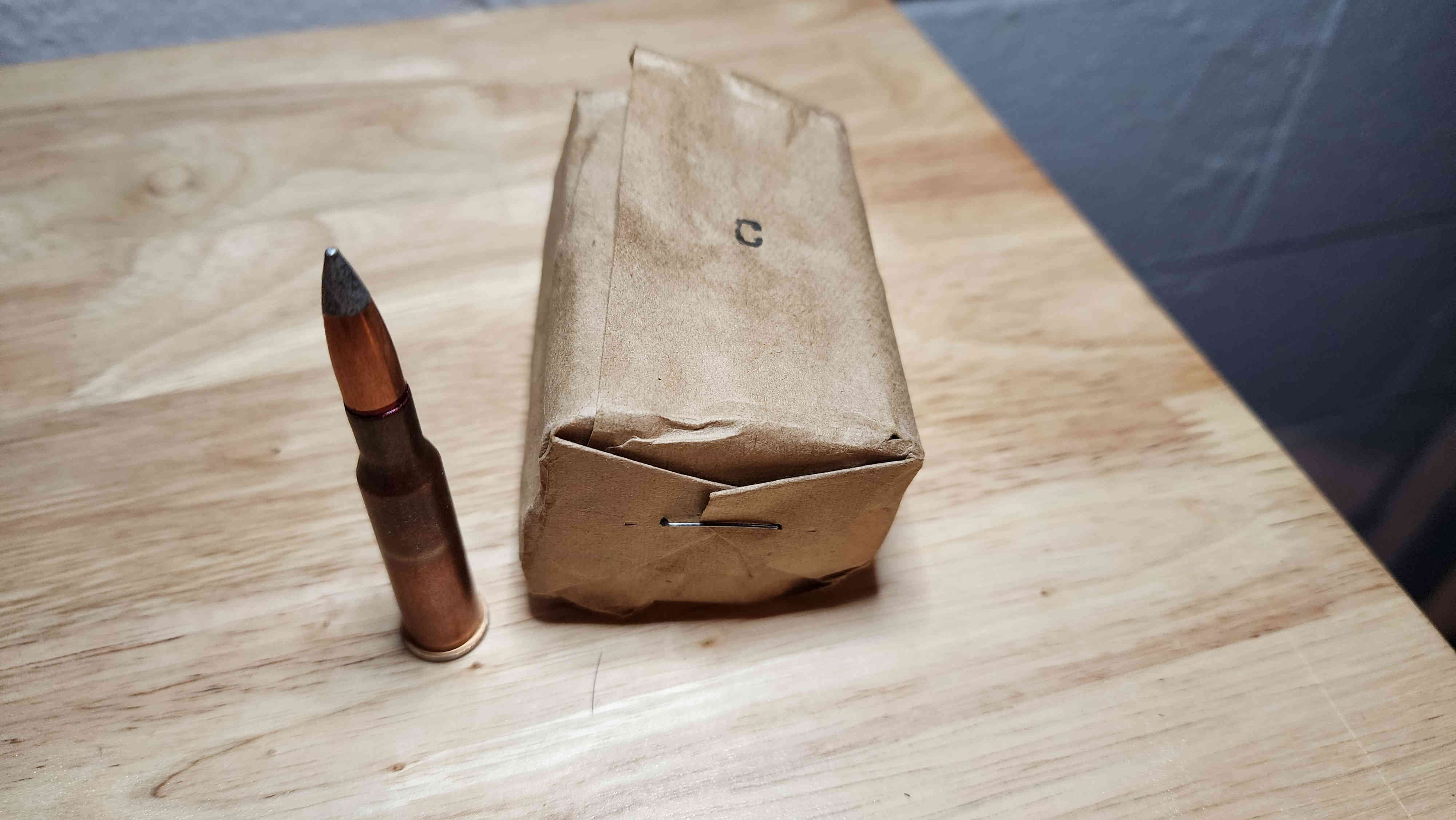 Brown 20-round Soviet surplus packet of 7.62×54mmR from 1977