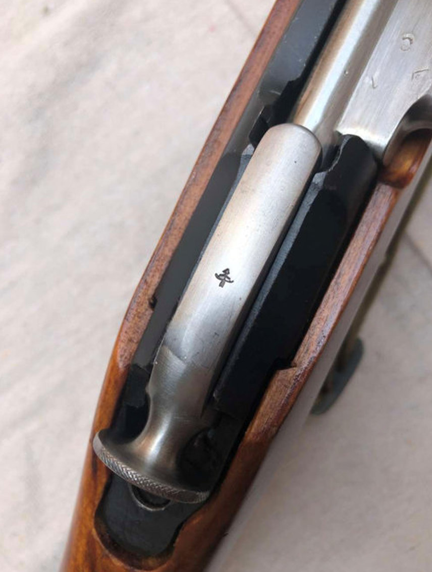 Stock and buttplate view showing serial number