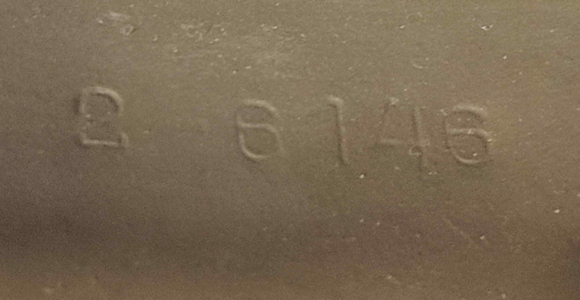 Embossed rear stamp 2 6146 showing size and steel lot number