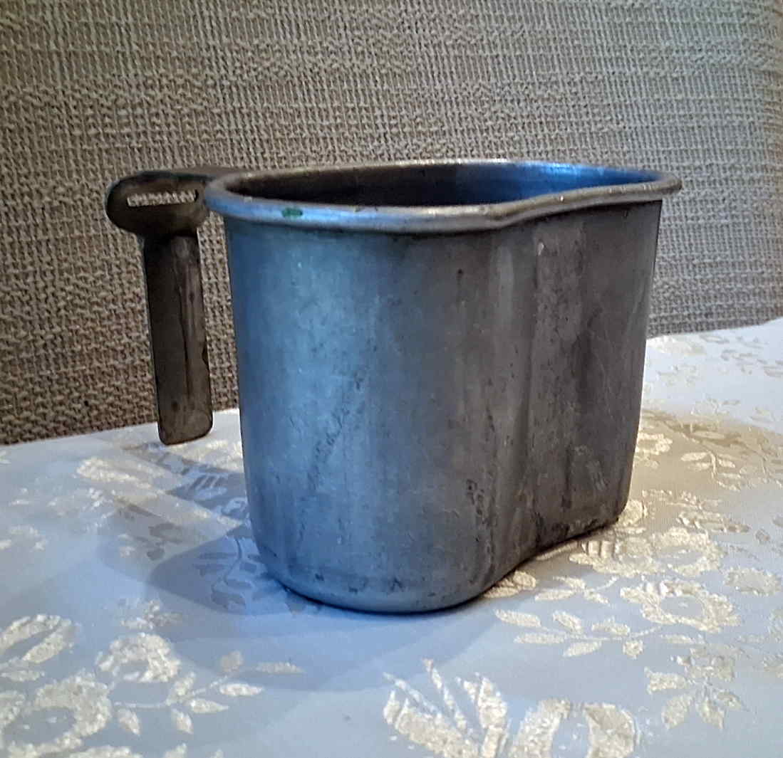Unmarked aluminum M1910-pattern nesting cup with folding handle