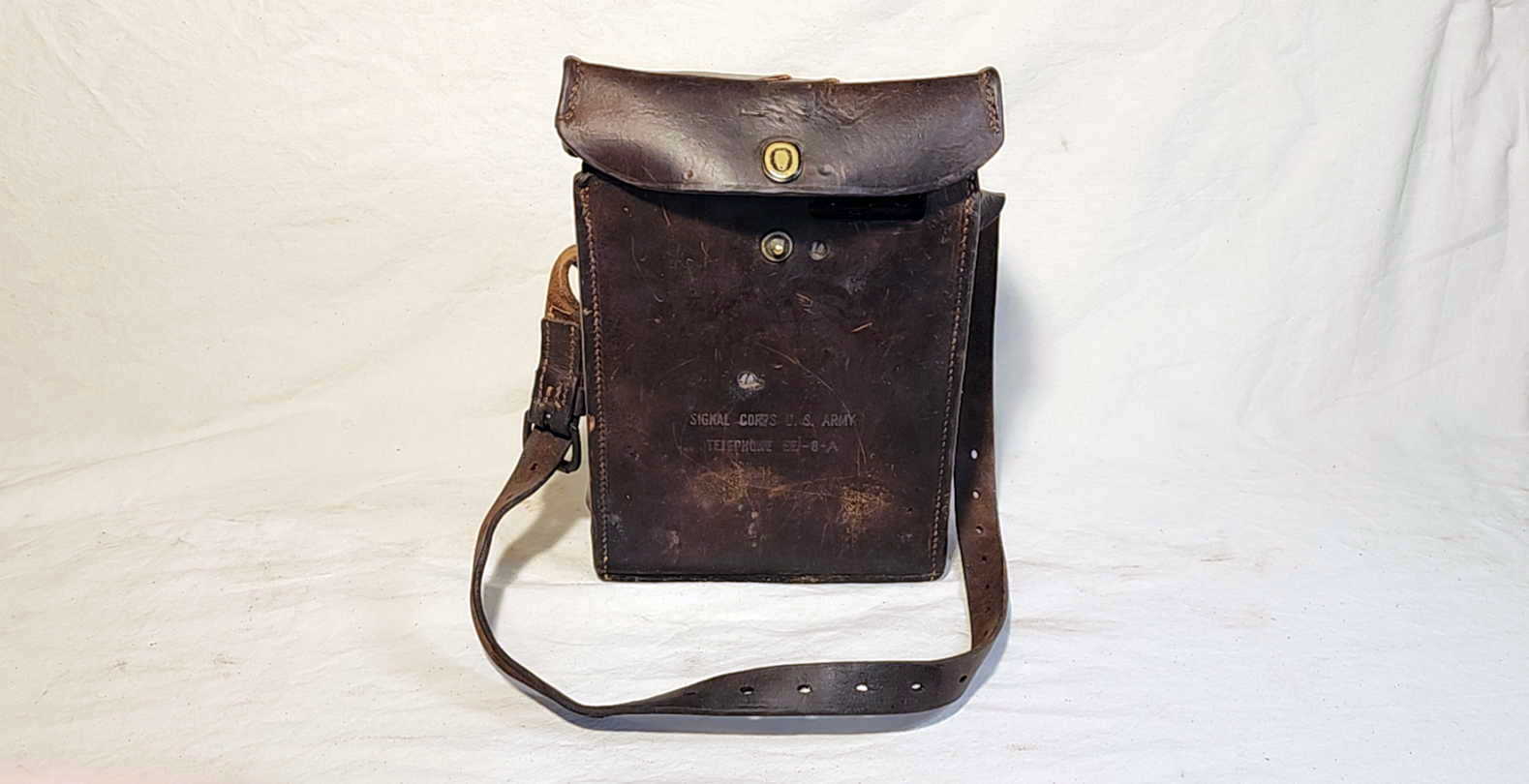EE-8-A field telephone in leather carrying case, front view