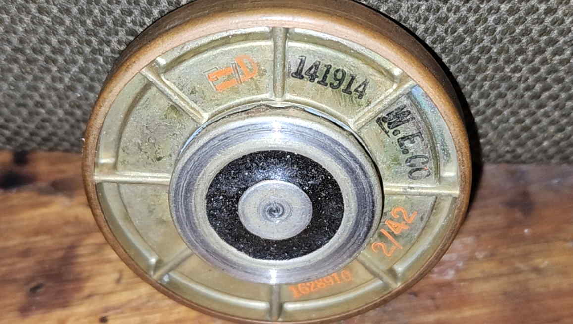 Transmitter element rear markings showing F1 141914 W.E. Co. with orange ink notations
