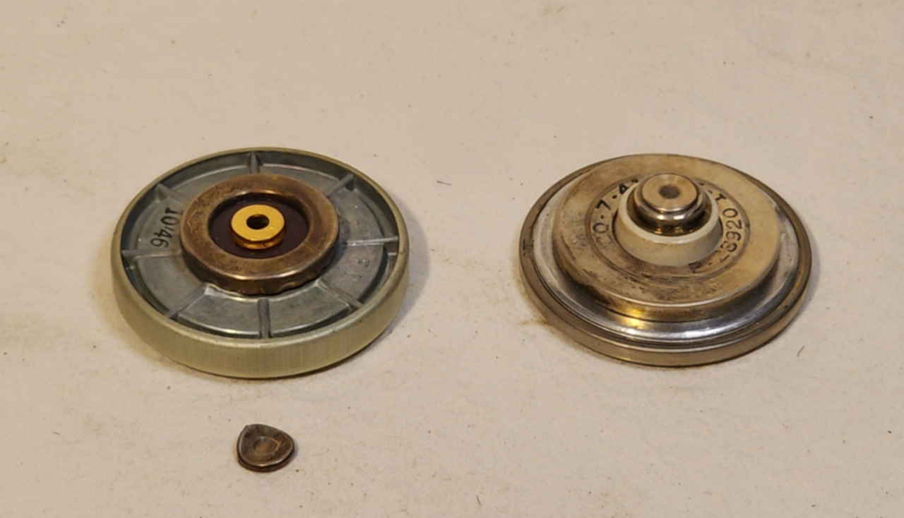 Donor Western Electric F1 microphone element and repaired original EE-8-A microphone element after carbon granule replacement